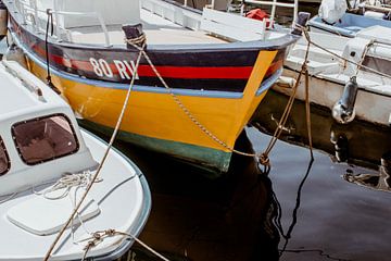 Close up of colorful boat in the harbor by Suzanne Fotografie