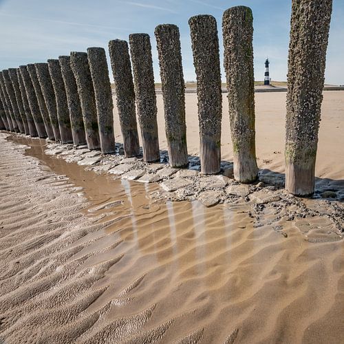 Lighthouse between breakwater
