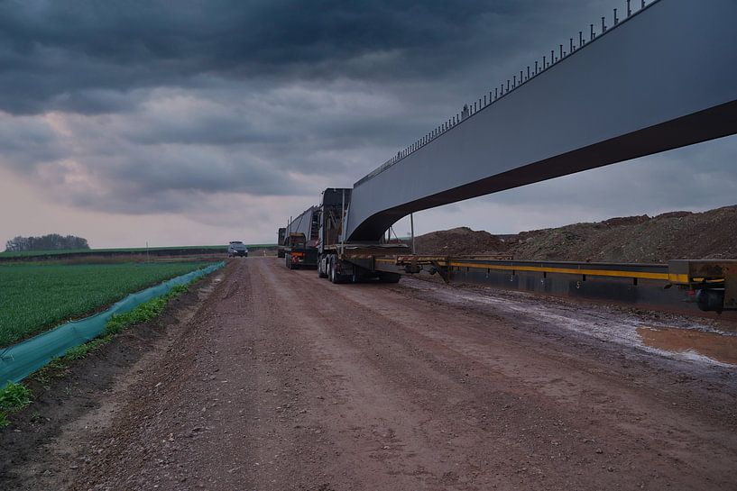 Arrival of heavy goods vehicles with bridge girders by Babetts Bildergalerie
