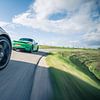 Porsche Boxter und Jaguar F-Type in der Kurve von Sytse Dijkstra