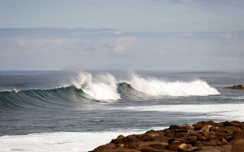 Waves breaking on the shore of Madeira