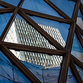 Glass and steel in the city centre by Thomas Riess