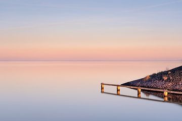 Magische zonsondergang vanaf het havenhoofd van Claire van Dun