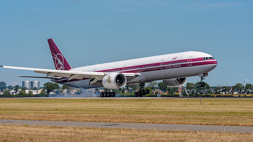 Qatar Airways Boeing 777-300 in retro livery. by Jaap van den Berg