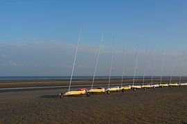 Sail trucks on the beach by Auke Schelstraete