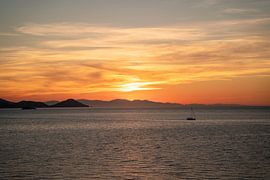 Sunset on Elba with a view of the sea & by boat by Leo Schindzielorz