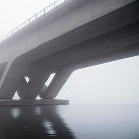 Concrete bridge in dense fog by Bianca de Haan