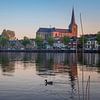 IJsselfront van Kampen met Bovenkerk bij zonsondergang van Gerrit Veldman