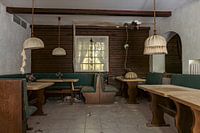 Abandoned Restaurant with Rustic Chairs