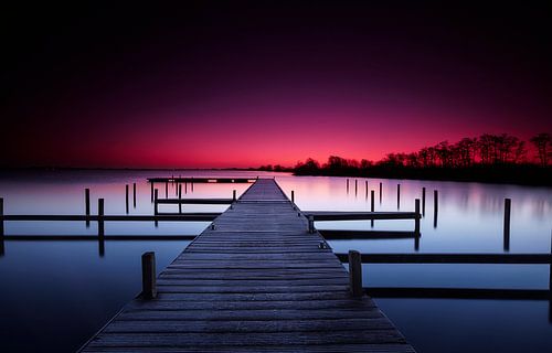 Empty wooden jetty in a quiet lake