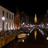 Amsterdam : vue atmosphérique de nuit de la Zuiderkerk sur Lex van Doorn