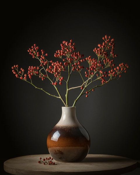 Brown vase with red berries by Paul Kaandorp