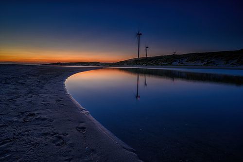 Reflectie windmolens Slufterstrand