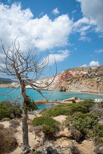 rocky coastline with beach on Milos, Greece