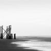 wooden structure on the beach by Shadia Bellafkih