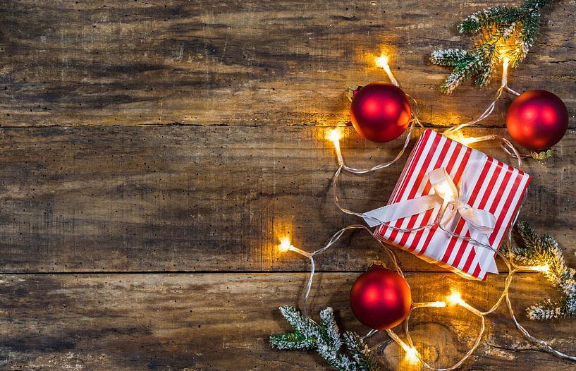 Christmas present with festive light decoration by Alex Winter
