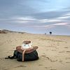 Getting a breath of fresh air on the beach by Christa Krus