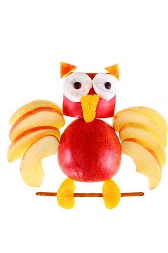 Hibou sculpté dans une pomme