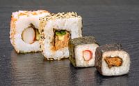 Sushi arrangement on stone by Achim Prill thumbnail