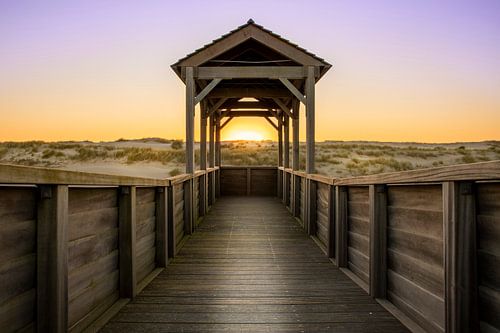 Symmetrie zonsondergang duinen in Petten