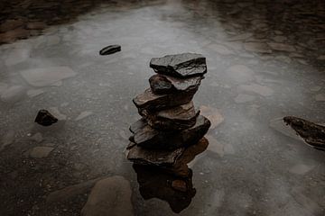 Meditation tower stones in water by Anouk Strijbos