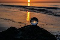 Coucher de soleil dans une sphère de verre