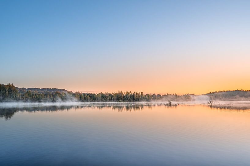 Misty sunrise at the water's edge by John van de Gazelle fotografie