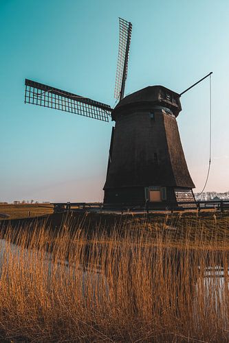 Zonsondergang van een molen