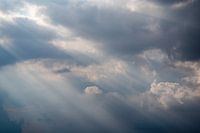 Dark clouds with sun rays