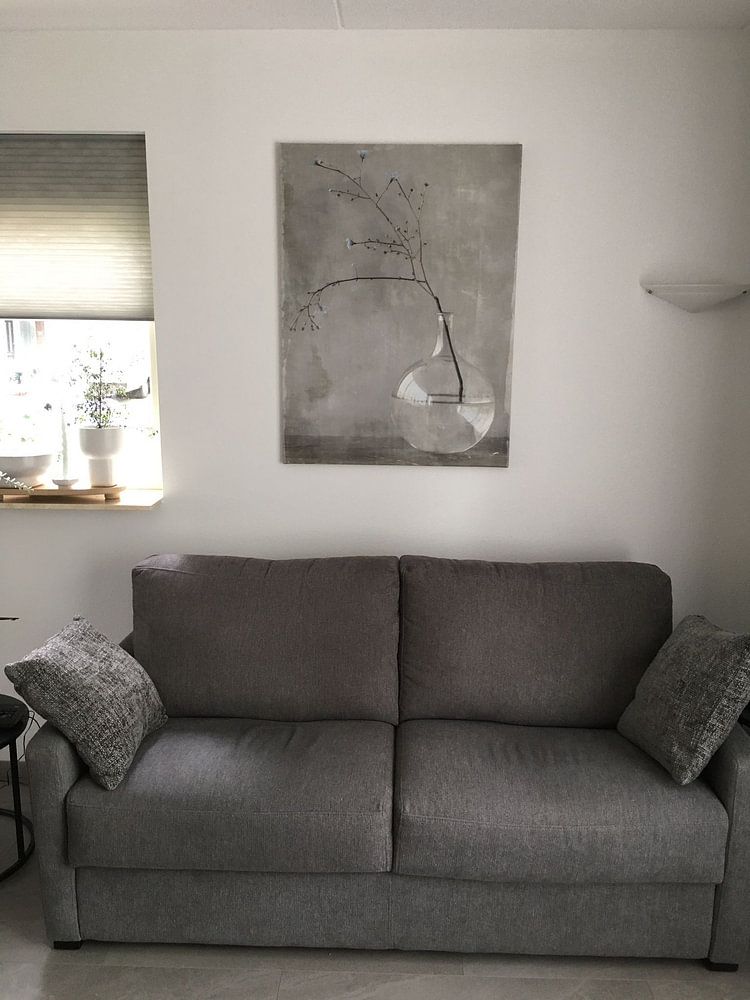 Stilleven met een vaas en een tak bloesem in Japandi stijl  van Japandi Art Studio 
