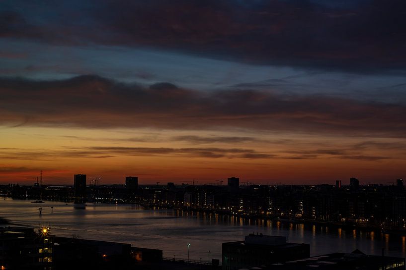 Blue orange sunrise over Amsterdam by Thijs van Laarhoven