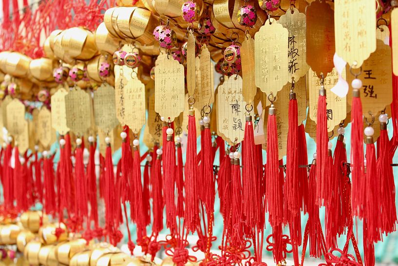 Prayers in a temple in China by Ingrid Meuleman