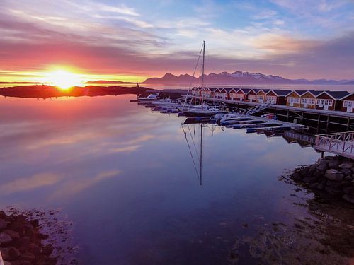 Colorful sunset in the harbor by Marjoleine Roos