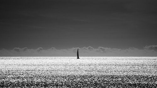 Lonely sailor. Seascape black and white.