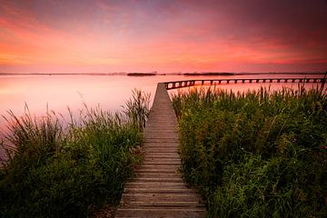 Zonsondergang met steiger van Dethmer Kupers