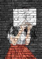 Tiener met boek graffiti op metselwerk