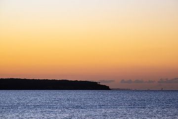 Sonnenuntergang an der Küste der Ostsee in Warnemünde von Rico Ködder