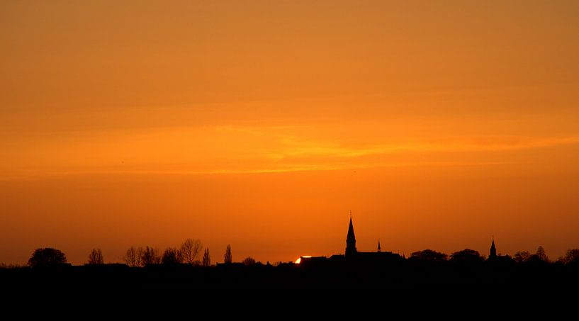 Zonsondergang op een mooie winterdag van Dirk Jan Kralt