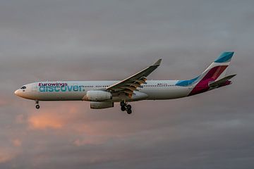 An Airbus A330 of German airline Eurowings has almost landed at Frankfurt airport. by Jaap van den Berg