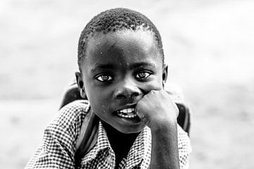 Portrait of a Ugandan boy ready for another school day. by Milene van Arendonk