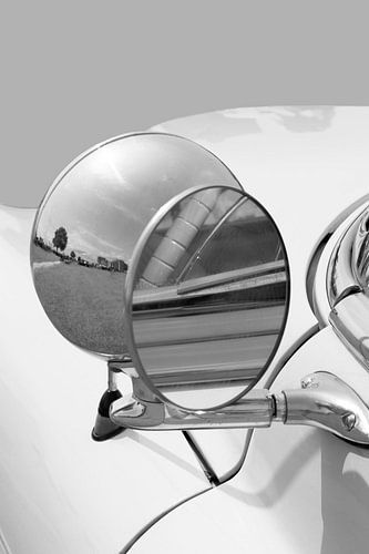 Vintage Design. Classic car mirror with light in black and white.