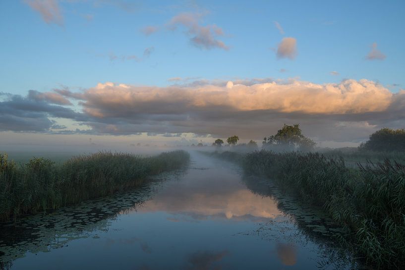 Clouds and water by Tessa van der Geer