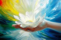 Abstract colourful flower in a hand