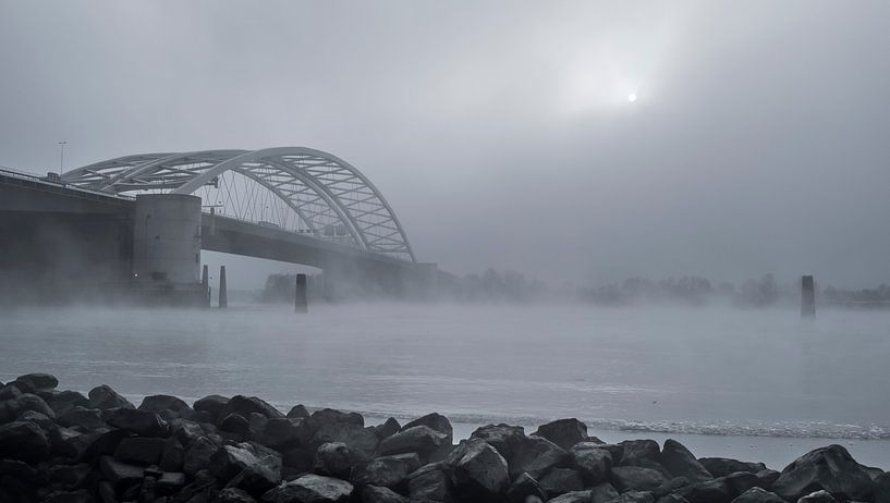 Van Brienenoord bridge in the fog  by Jeroen van Dam