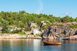 Boat off the archipelago island of Monsøya in Norway