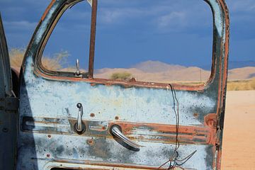 Old rusted broken car door by Bobsphotography