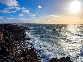 Sunset on the black cliffs by Stijn Cleynhens