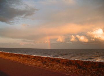 Rainbow on the sea van Beatrice Cloake