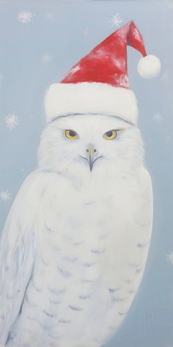 Sneeuwuil met een Kerstmuts aan