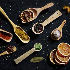 Cheerful variations with wooden spoons and spices. by Saskia Dingemans Awarded Photographer